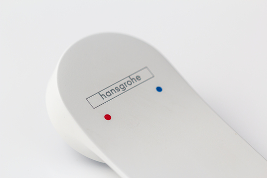 weißer Hansgrohe Armaturhebel mit Bedruckung.jpg